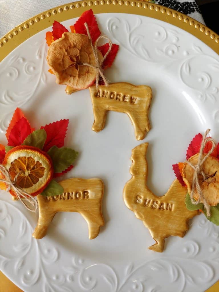 name cut out decorations on plate