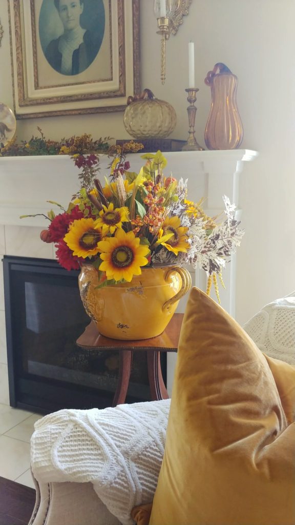 a large urn of fall flowers