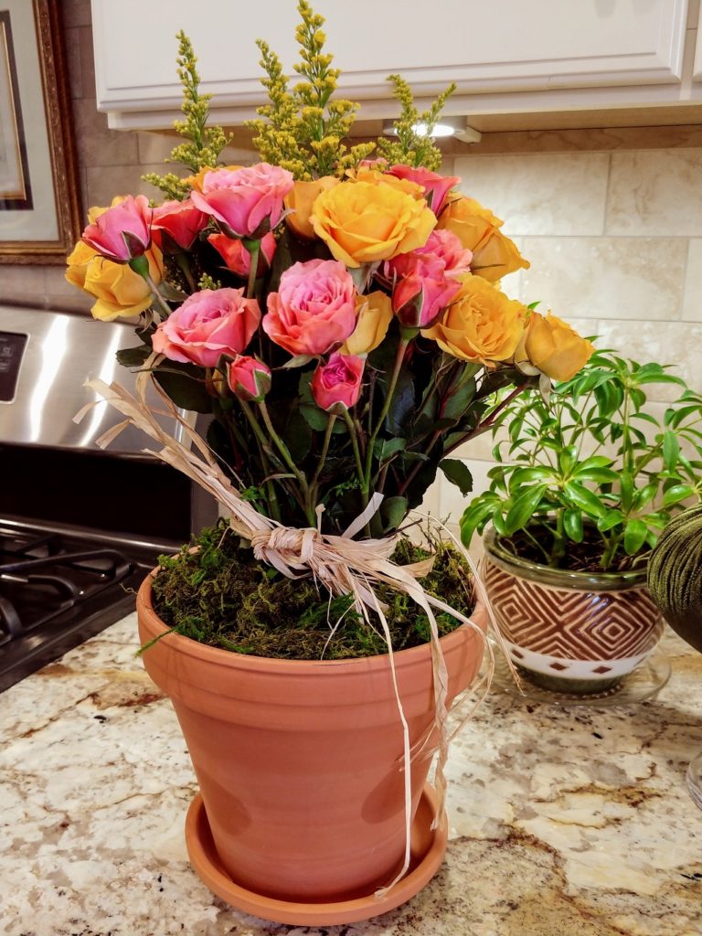 A bouquet of flowers in a pot