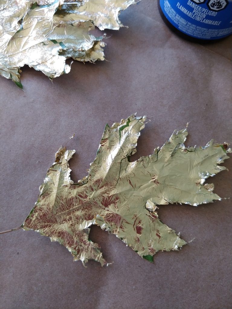 oak leaf that was painted with gold leaf