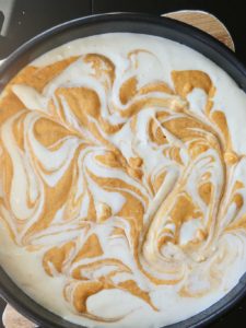 pumpkin swirl cheesecake in pan