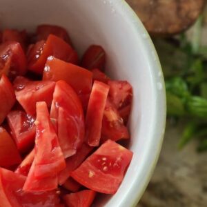 tomatoes cut up inbowl