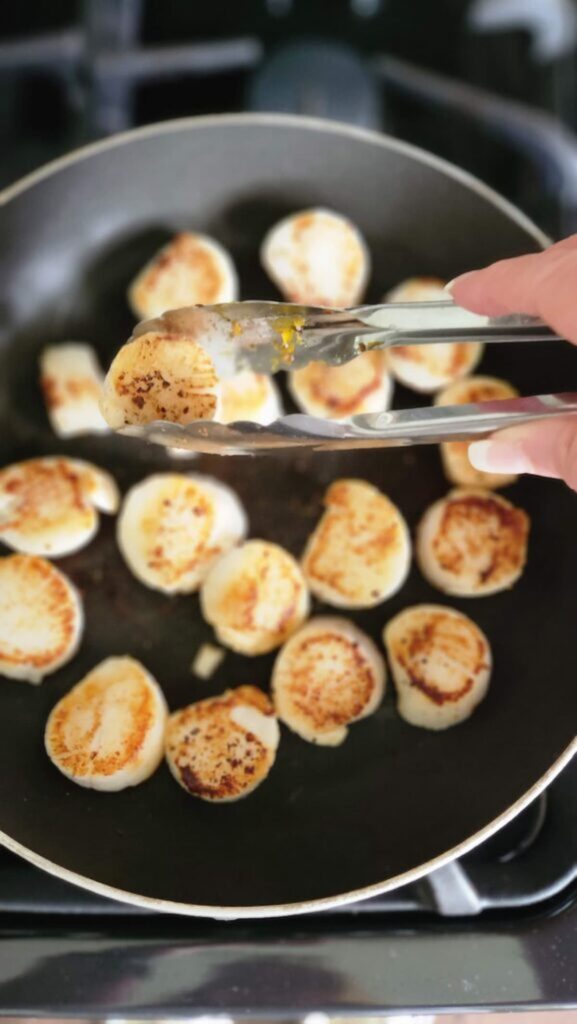 sauteed scallops in frying pan