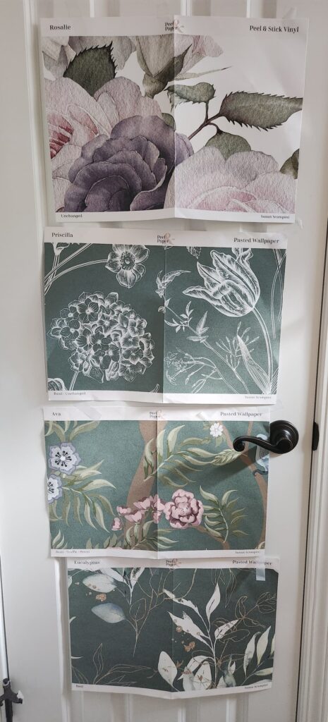 samples of wallpaper on door