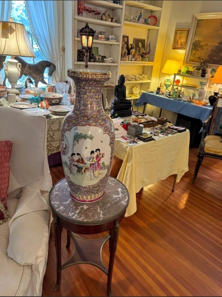 view of living room filled with estate sale items