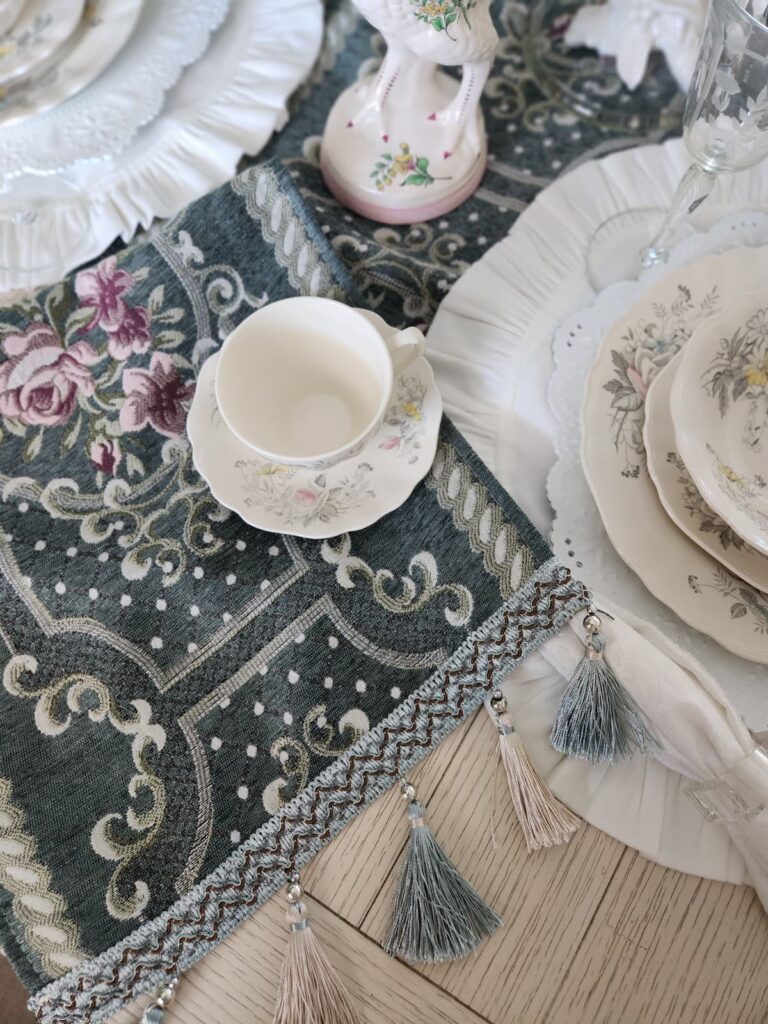 tapestry table runner with dishes 